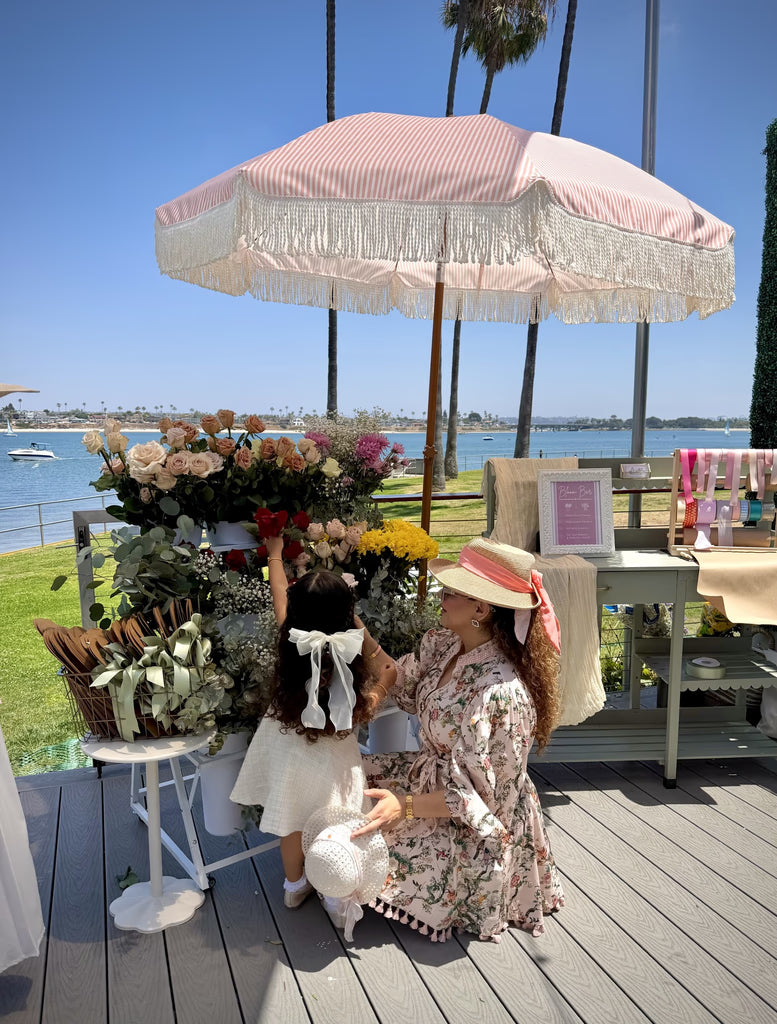Flower arranging setup by the water at LOLO'S Bloom Bar in San Diego